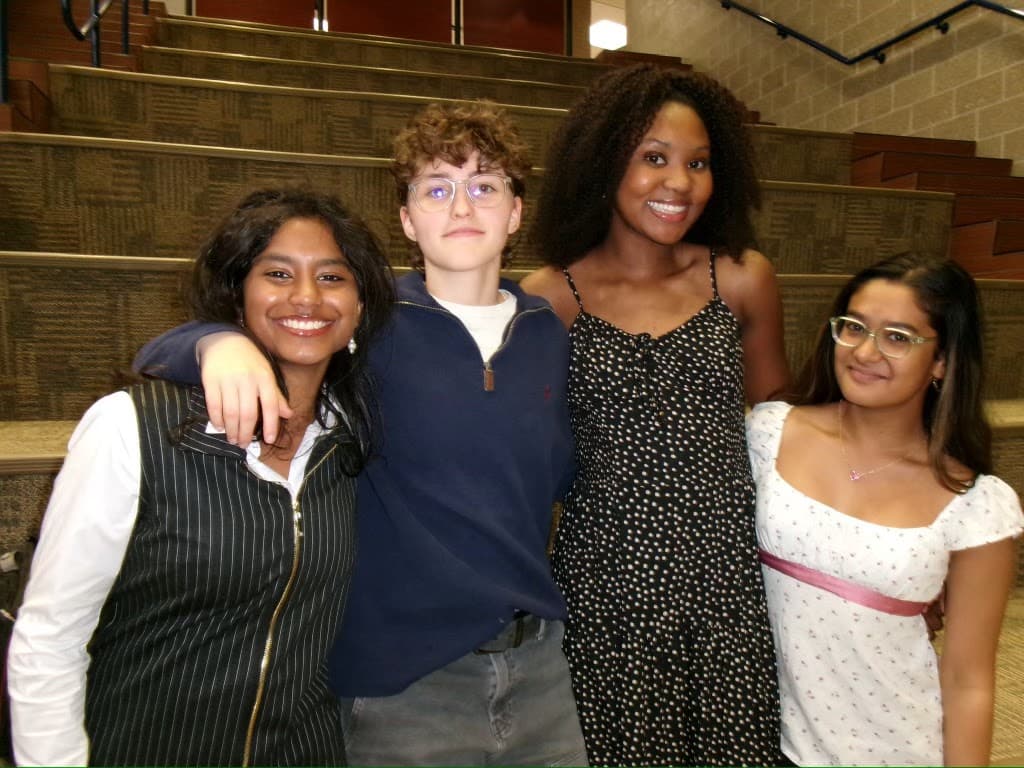 HSE Speech & Debate students gathered together in the auditorium